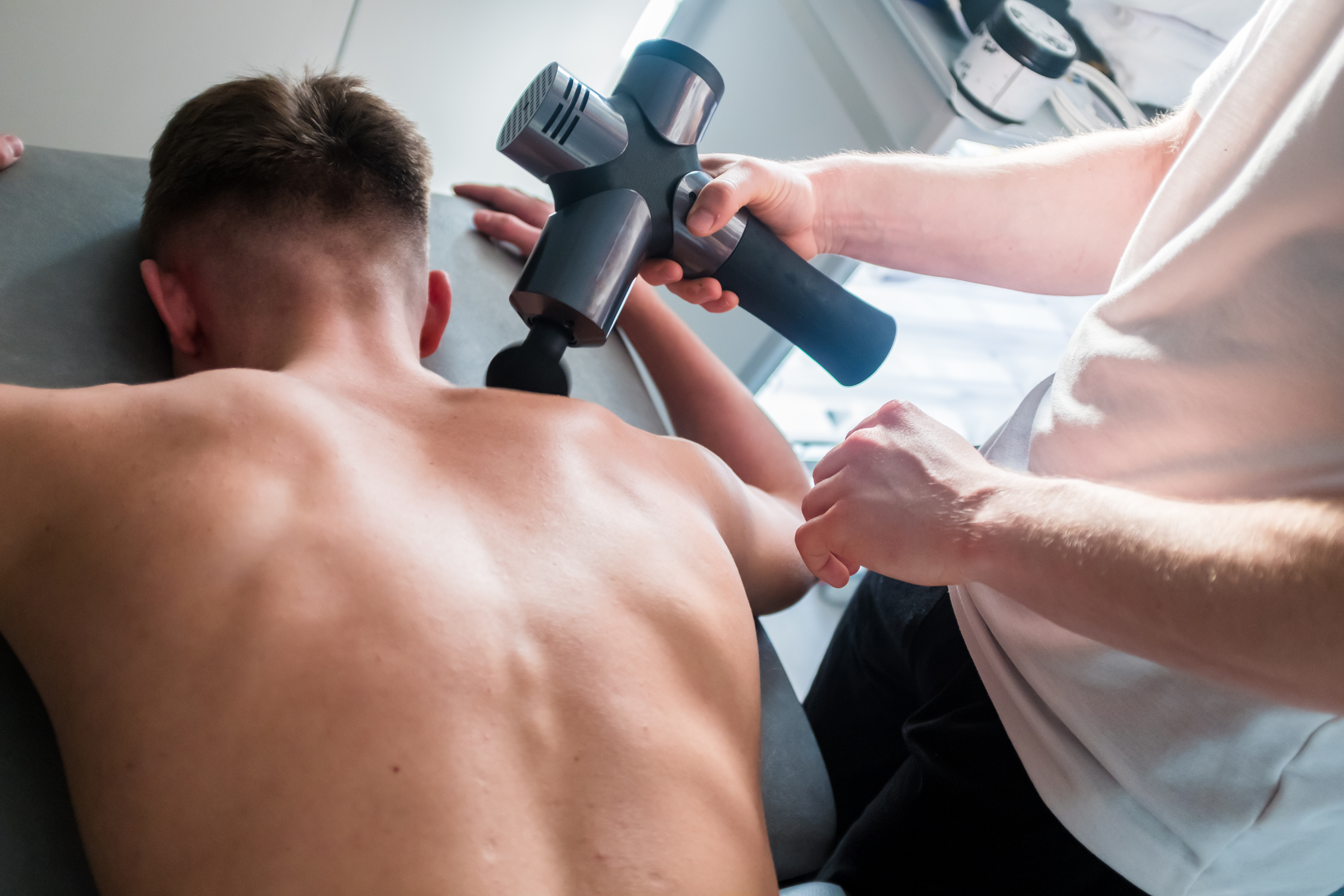 Are Massage Guns Good for Back Pain? - Blog